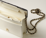 Chanel black quilted wallet on a chain 2022 collectors item