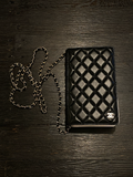 Chanel black quilted wallet on a chain 2022 collectors item