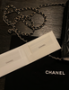 Chanel black quilted wallet on a chain 2022 collectors item