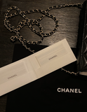 Chanel black quilted wallet on a chain 2022 collectors item